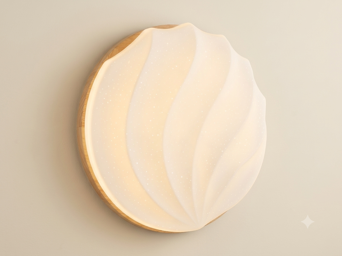 A circular light fixture with a wooden base and a wavy design that mimics the shape of a seashell, featuring a cover that distributes warm light with a subtle, shiny point effect resembling twinkling stars.