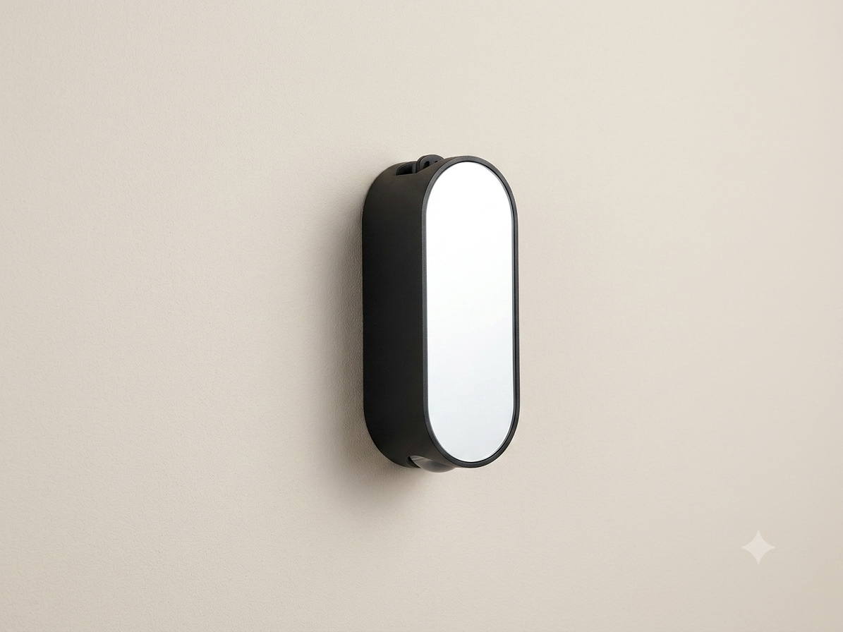A white wall sconce with a minimalist capsule design, equipped with a top sensor and providing indirect side lighting.