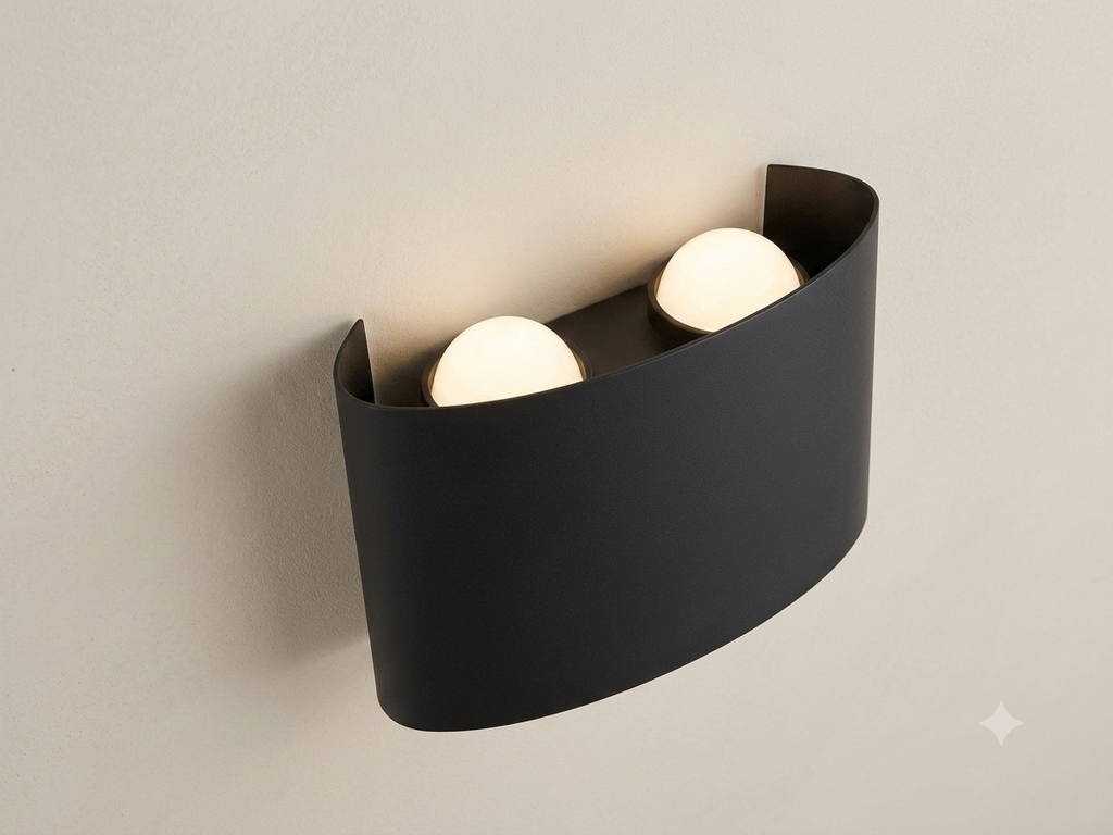 A white wall sconce with a simple and elegant curved design, providing soft overhead lighting.