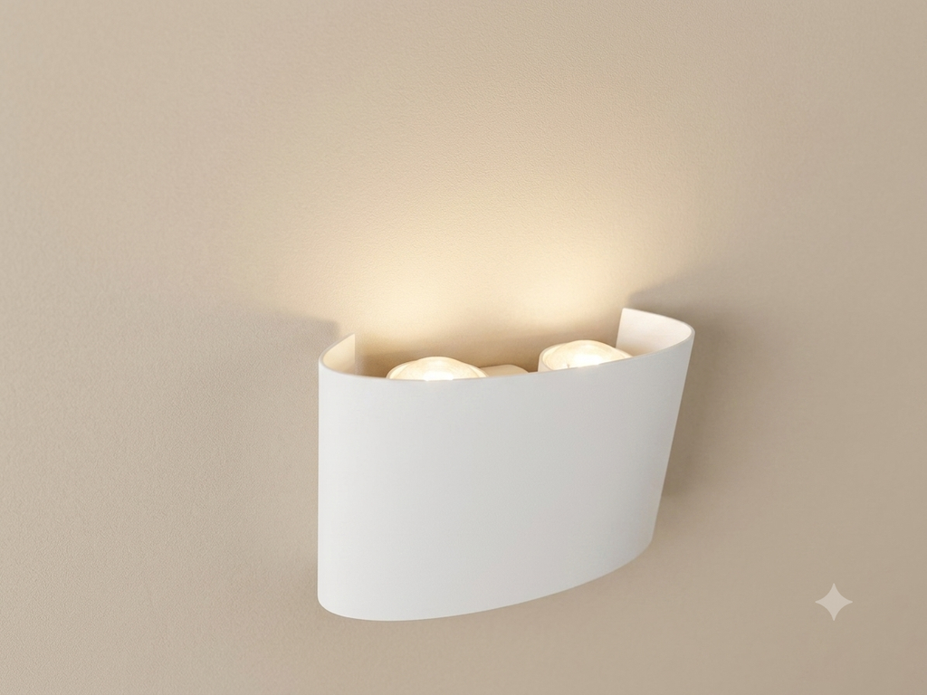 A white wall sconce with a simple and elegant curved design, providing soft overhead lighting.