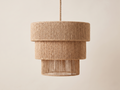 A rural chandelier made of jute rope (burlap).