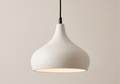 A minimalist pendant light unit inspired by soft organic shapes, featuring a matte white finish that brings a sense of calm and modern elegance to the space.