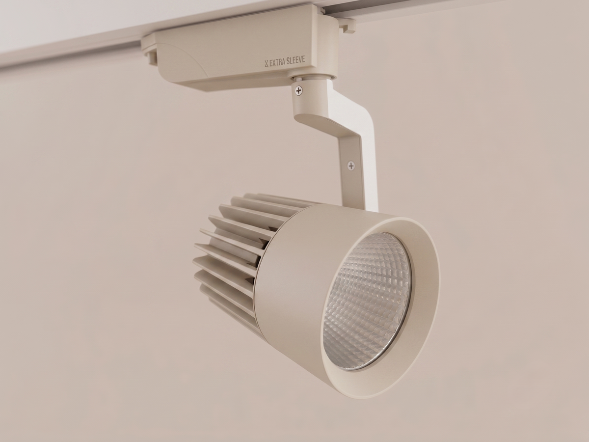 Track Light with a simple industrial design in a calm beige color.