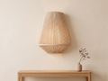 A bohemian wall lamp (wall sconce) made of ropes.