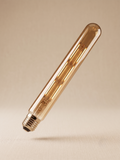 A long LED filament lamp with a tube shape and gold-colored glass.