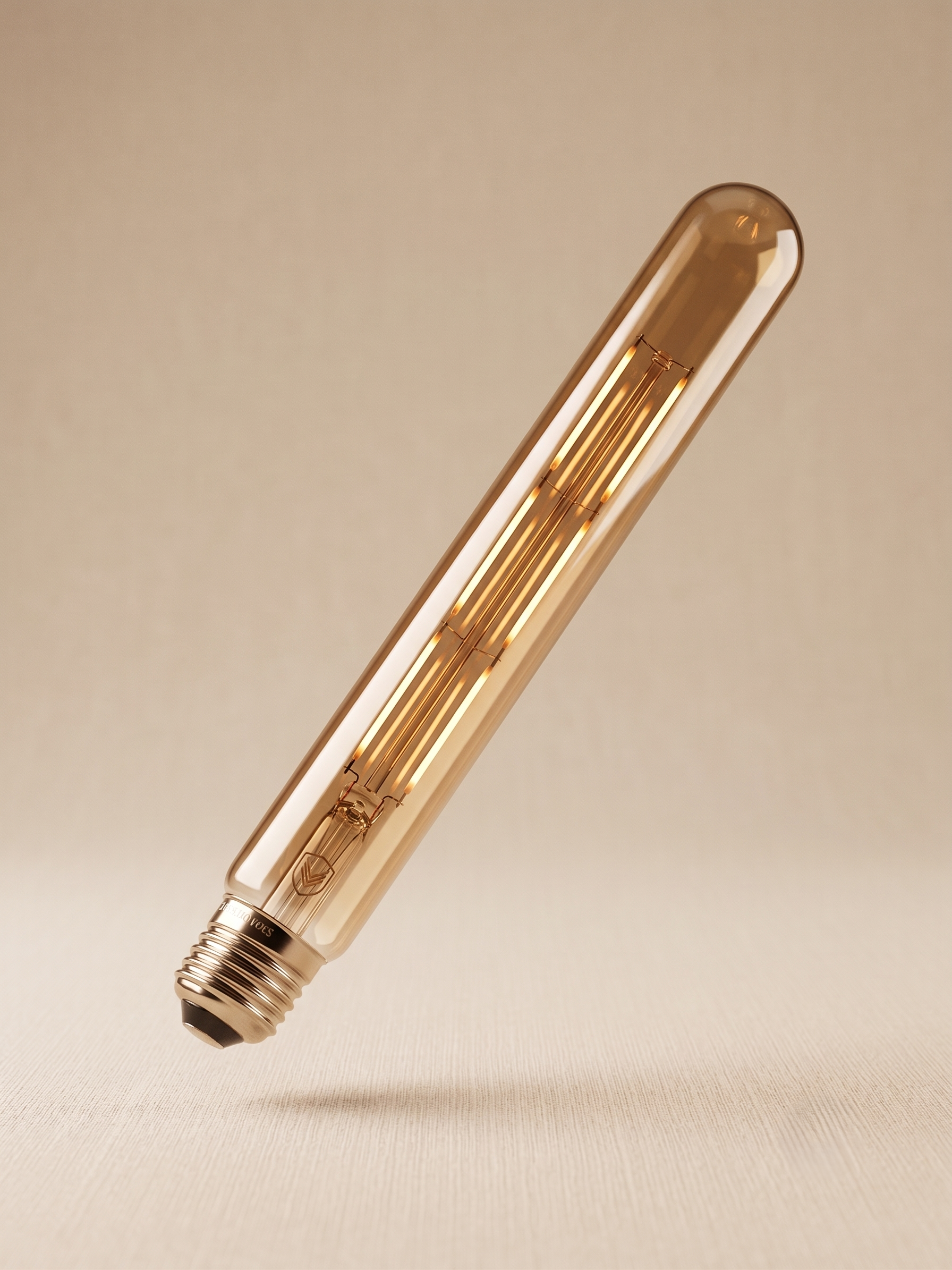 A long LED filament lamp with a tube shape and gold-colored glass.