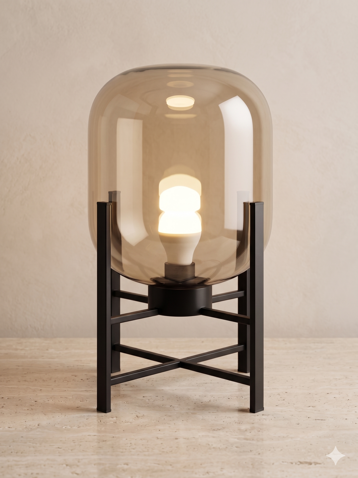 A modern glass table lamp on a black metal stand.