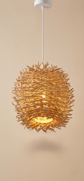 A pendant light with a spherical design inspired by birds' nests, made from intertwined wooden branches.