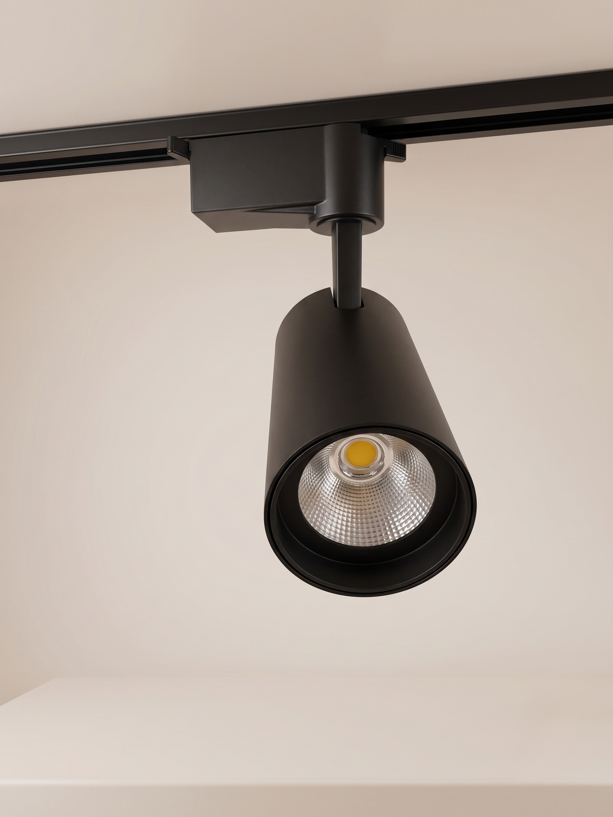 Track lights in black with a prominent geometric design.