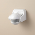 Wall-mounted swiveling PIR motion sensor