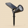 Solar-powered garden spike spotlight with panel