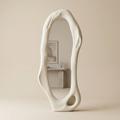 Tall sculptural organic full-length mirror with textured plaster finish