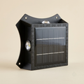 Decorative patterned solar wall sconce