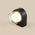 Modern globe-lens solar wall light