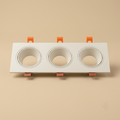White triple-head recessed spotlight fixture