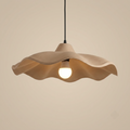 Sandstone donut pendant light with exposed bulb