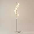 Floor lamp with six staggered frosted glass globes on marble base