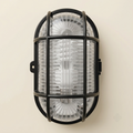 White oval bulkhead wall light with cage guard